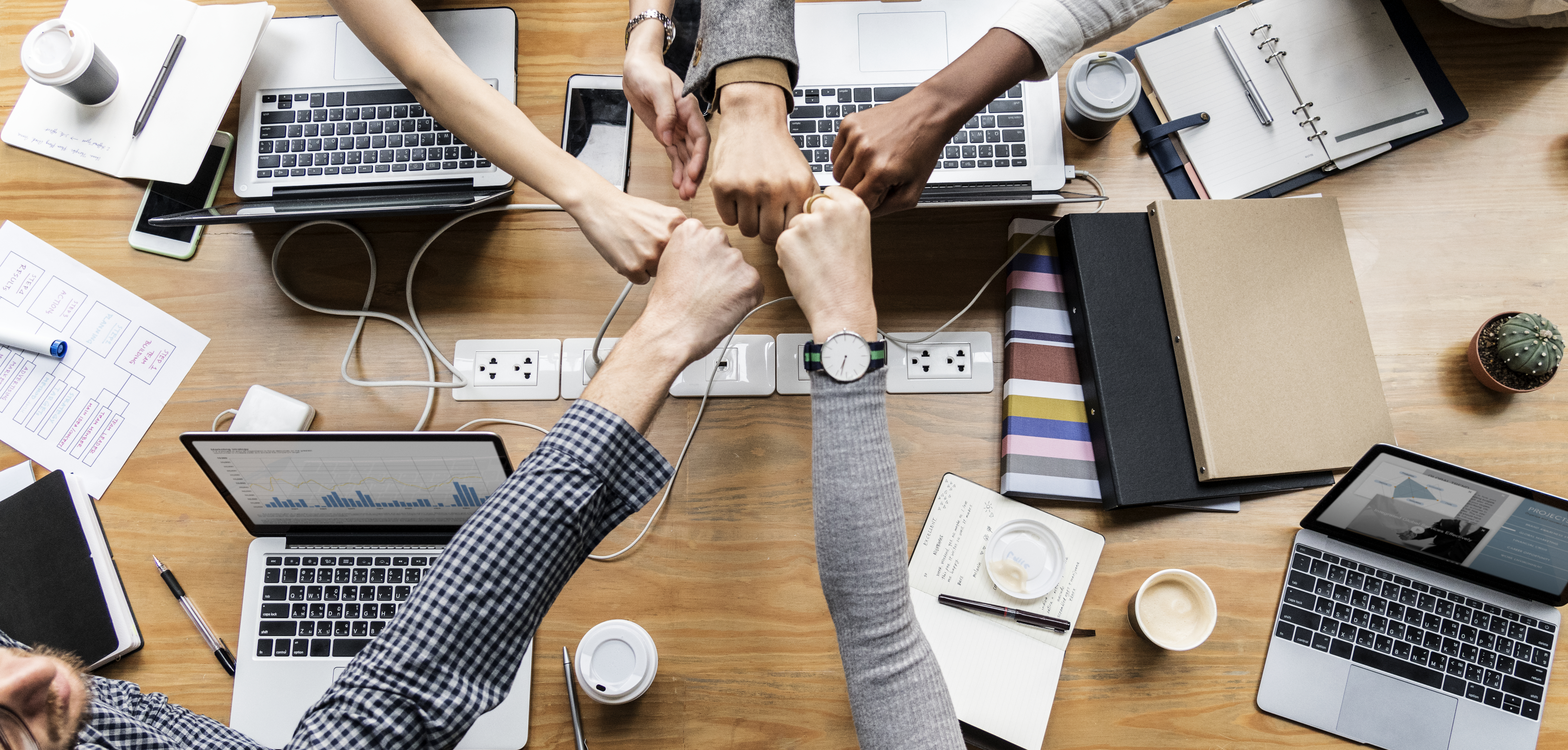 colleagues-giving-fist-bump.jpg